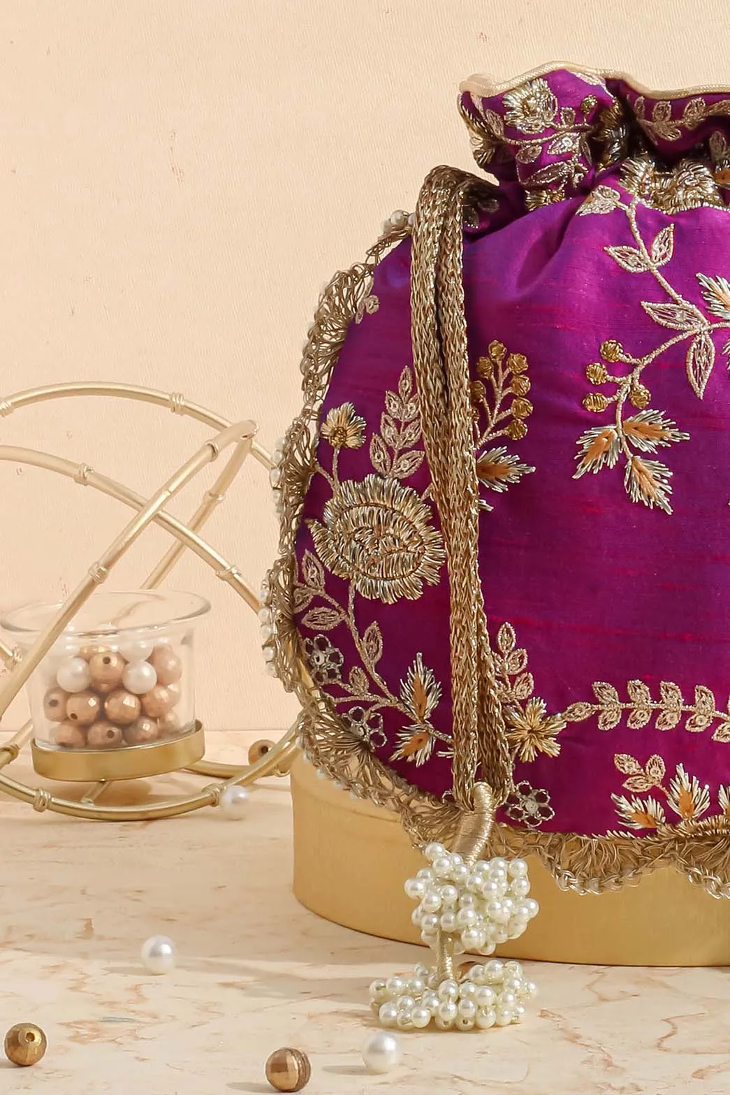 Purple embroidered scallop potli bag