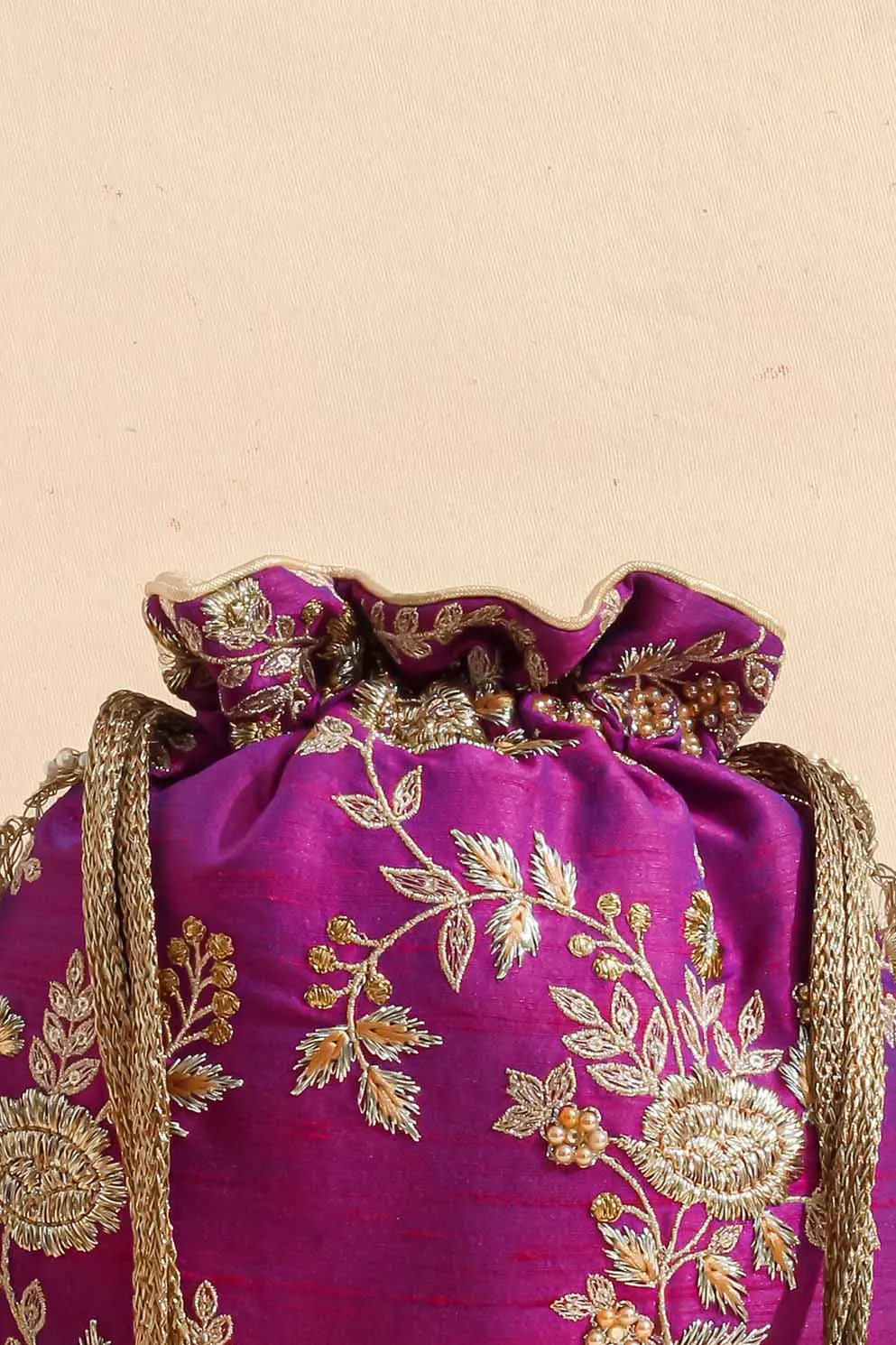 Purple embroidered scallop potli bag